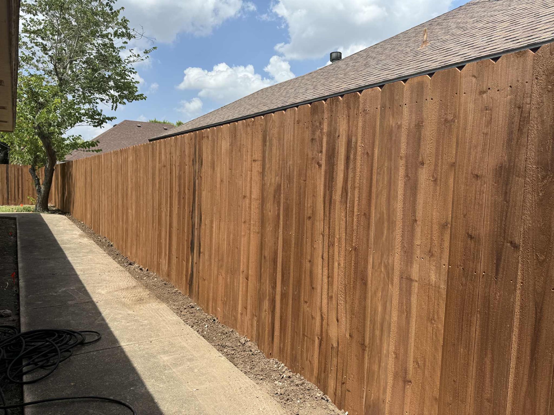 Cedar privacy fence installed by Texas Contractors in the Rio Grande Valley